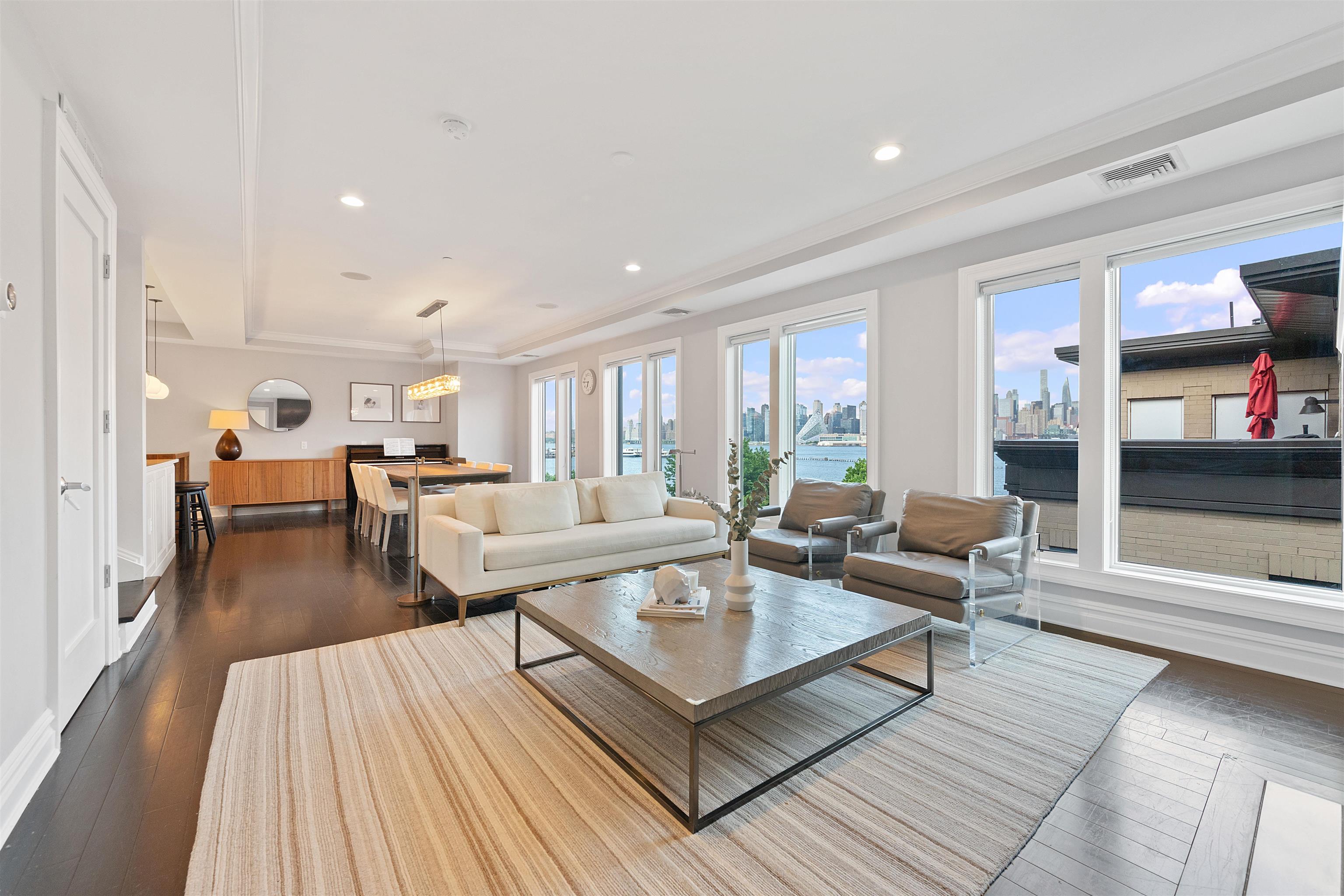 a living room with furniture and a table