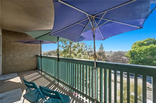 a view of outdoor space with deck and wooden floor