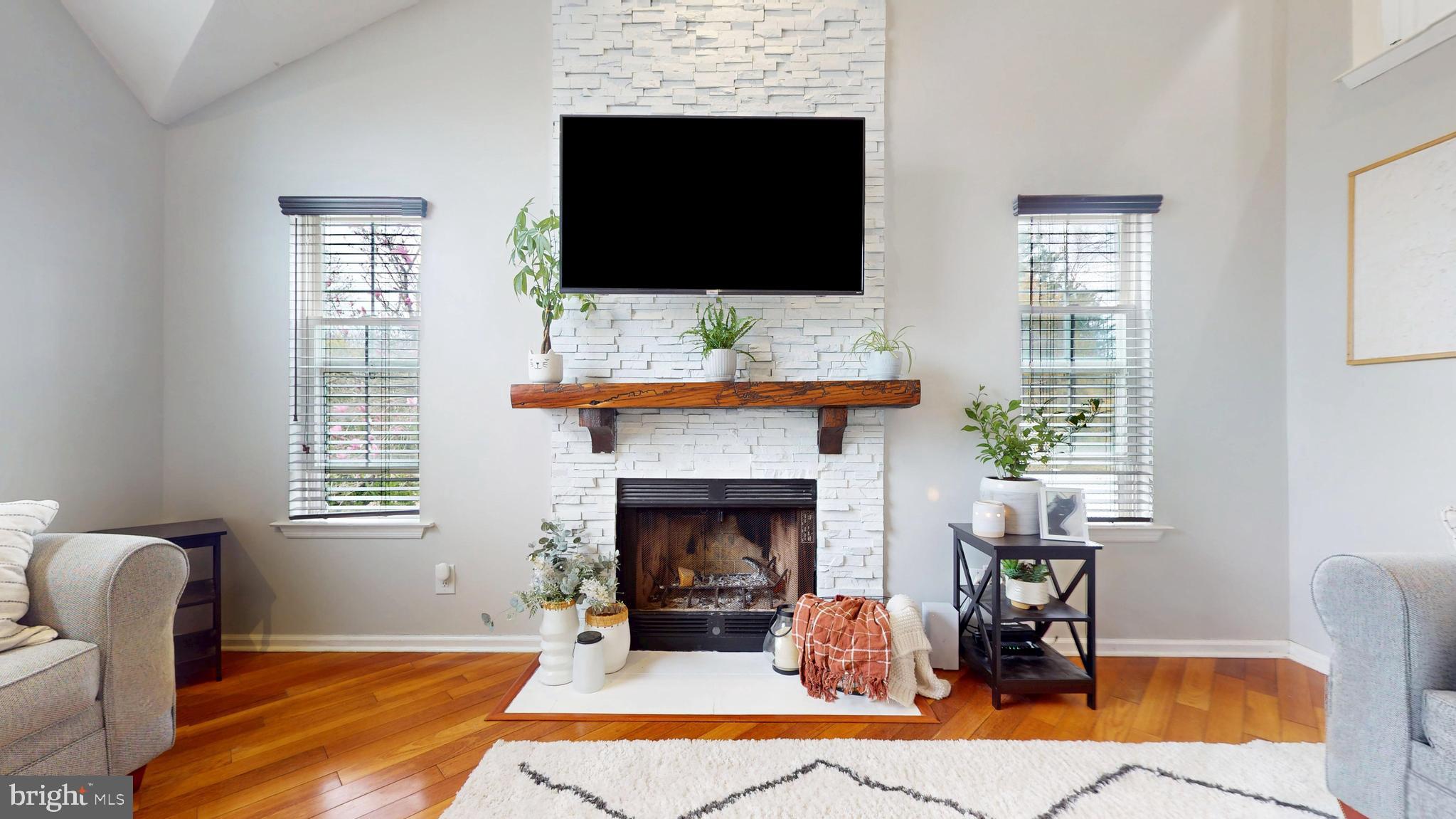 332 Copperfield Drive Williamstown, NJ 08094 - Photo 13 of 46 a living room with furniture and a flat screen tv