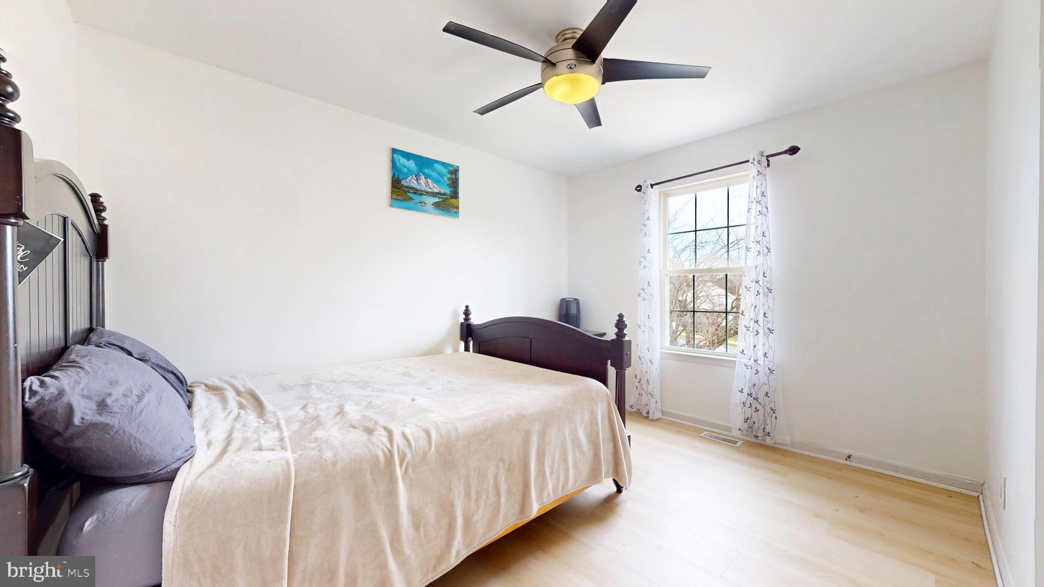 332 Copperfield Drive Williamstown, NJ 08094 - Photo 27 of 46 a bedroom with a bed and a window