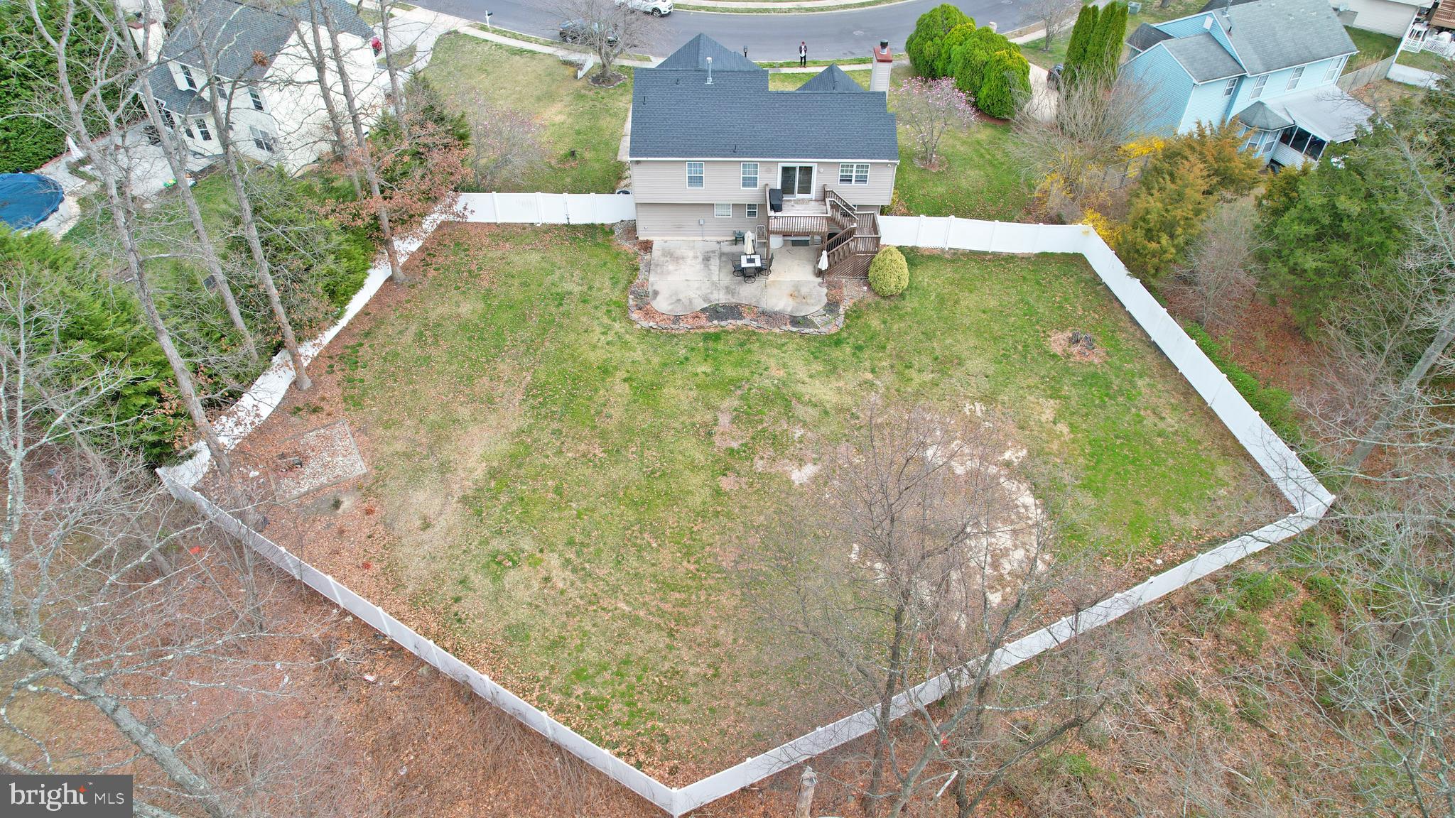332 Copperfield Drive Williamstown, NJ 08094 - Photo 7 of 46 a view of a yard with potted plants