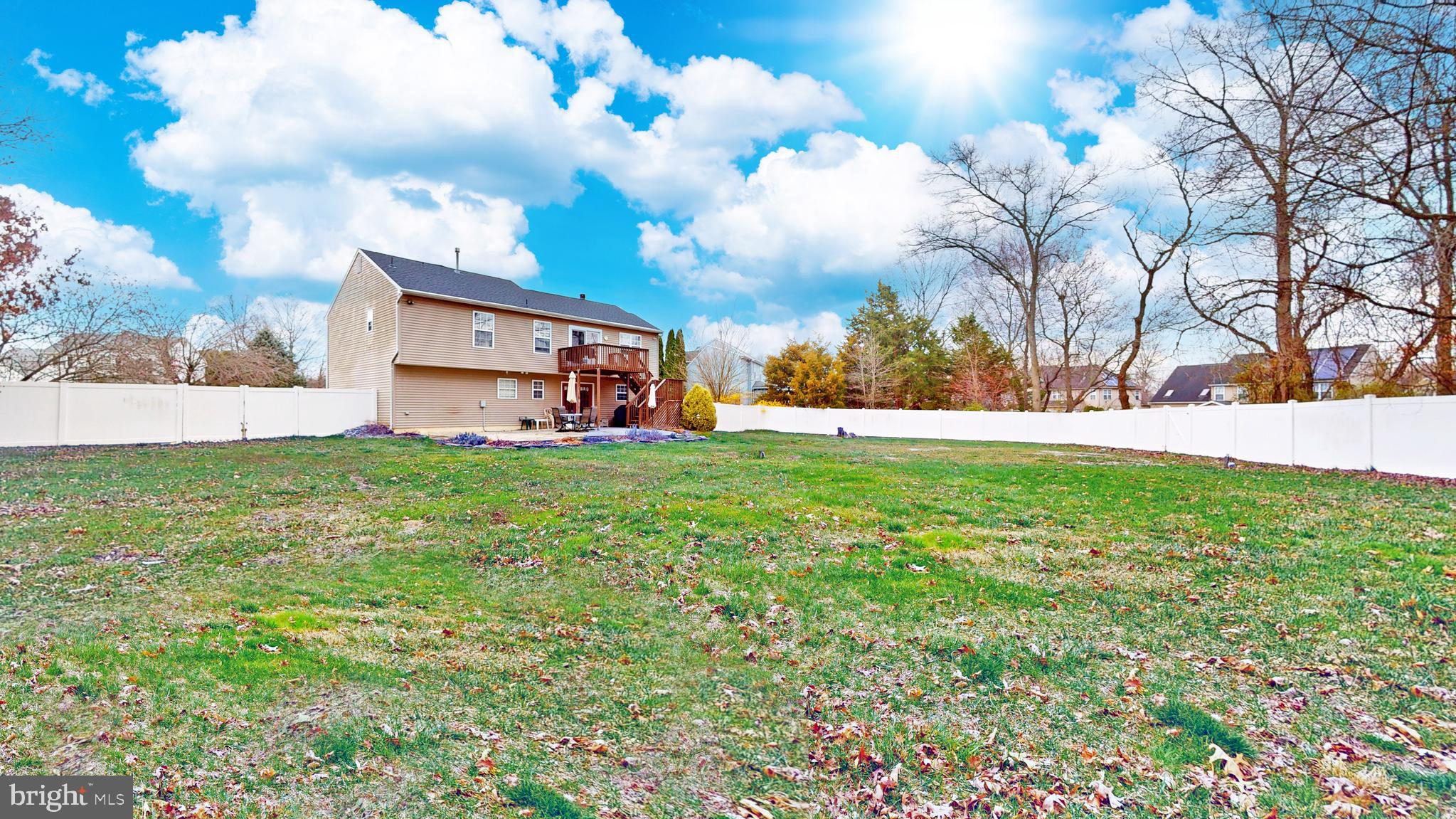 332 Copperfield Drive Williamstown, NJ 08094 - Photo 9 of 46 a view of a yard with an tree and a plant