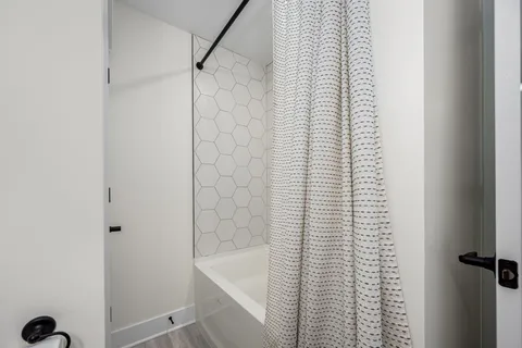 a bathroom with a bathtub