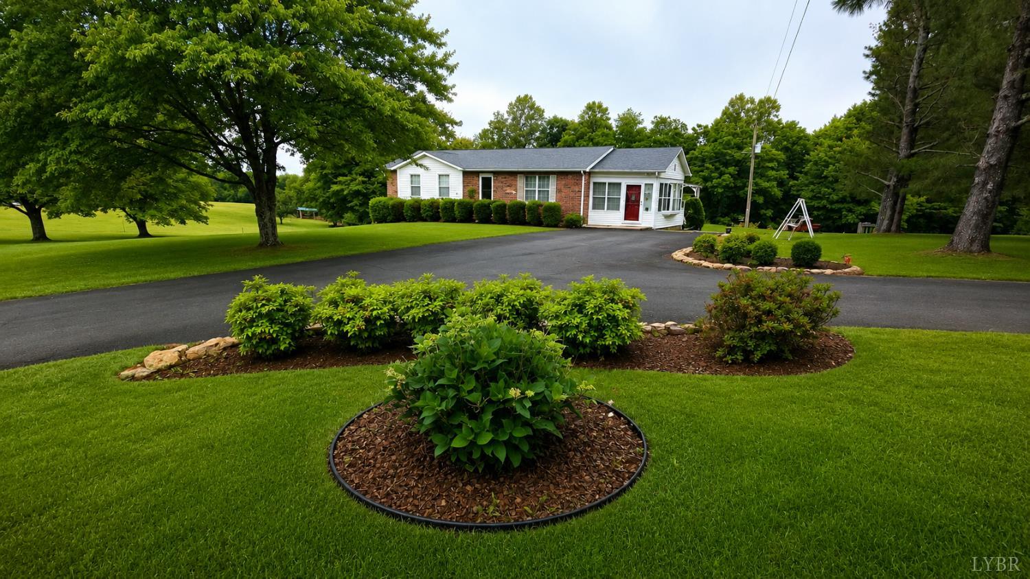 2346 Mitchell Mill Road Gladys, VA 24554 - Photo 33 of 38 a view of a house with a backyard