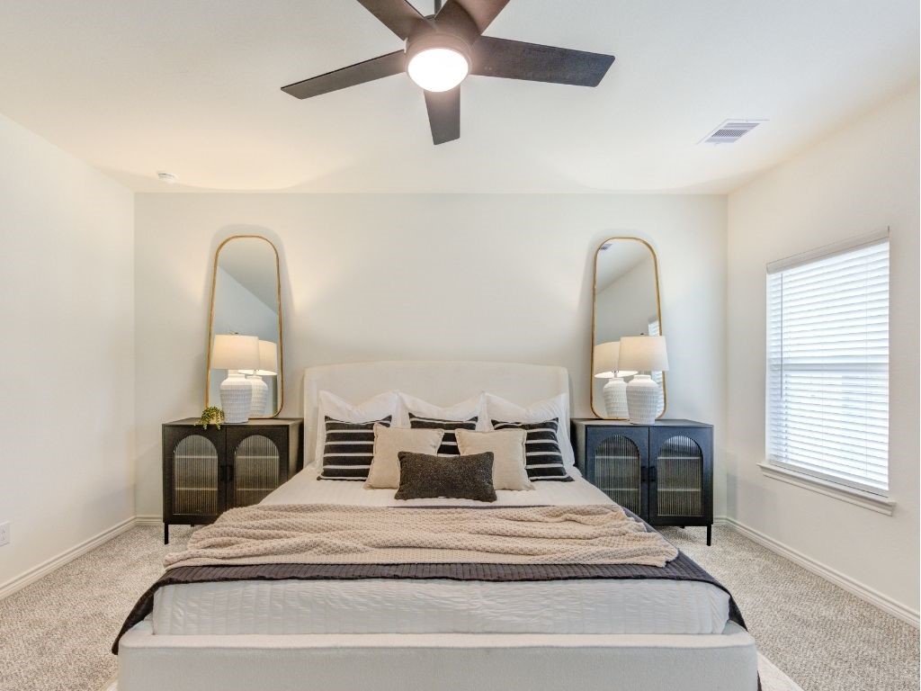 140 County Road 2278 Cleveland, TX 77327 - Photo 4 of 10 a spacious bedroom with a bed and window