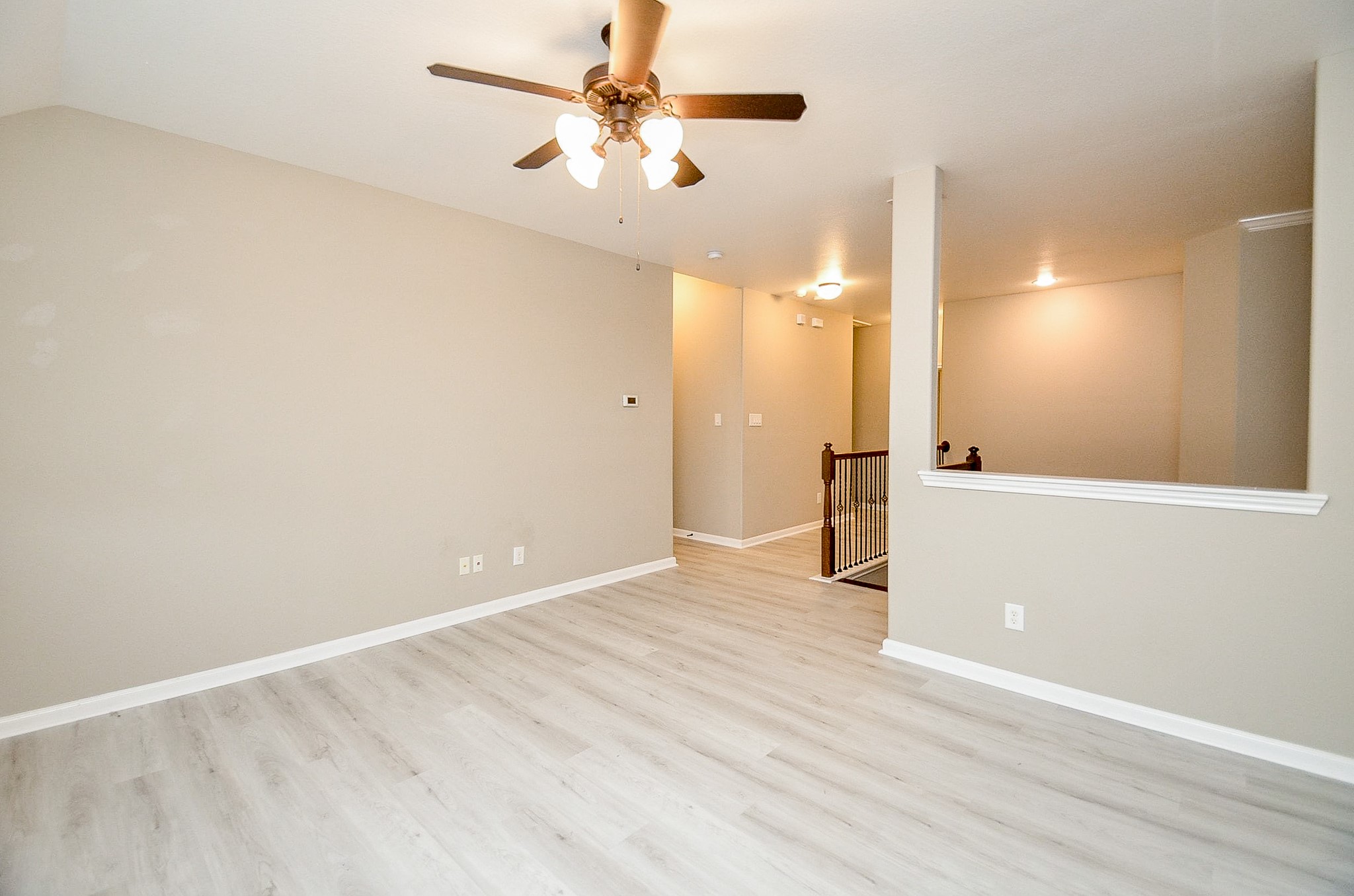 1510 Kent Valley Lane Rosenberg, TX 77471 - Photo 21 of 33 wooden floor in an empty room with a window
