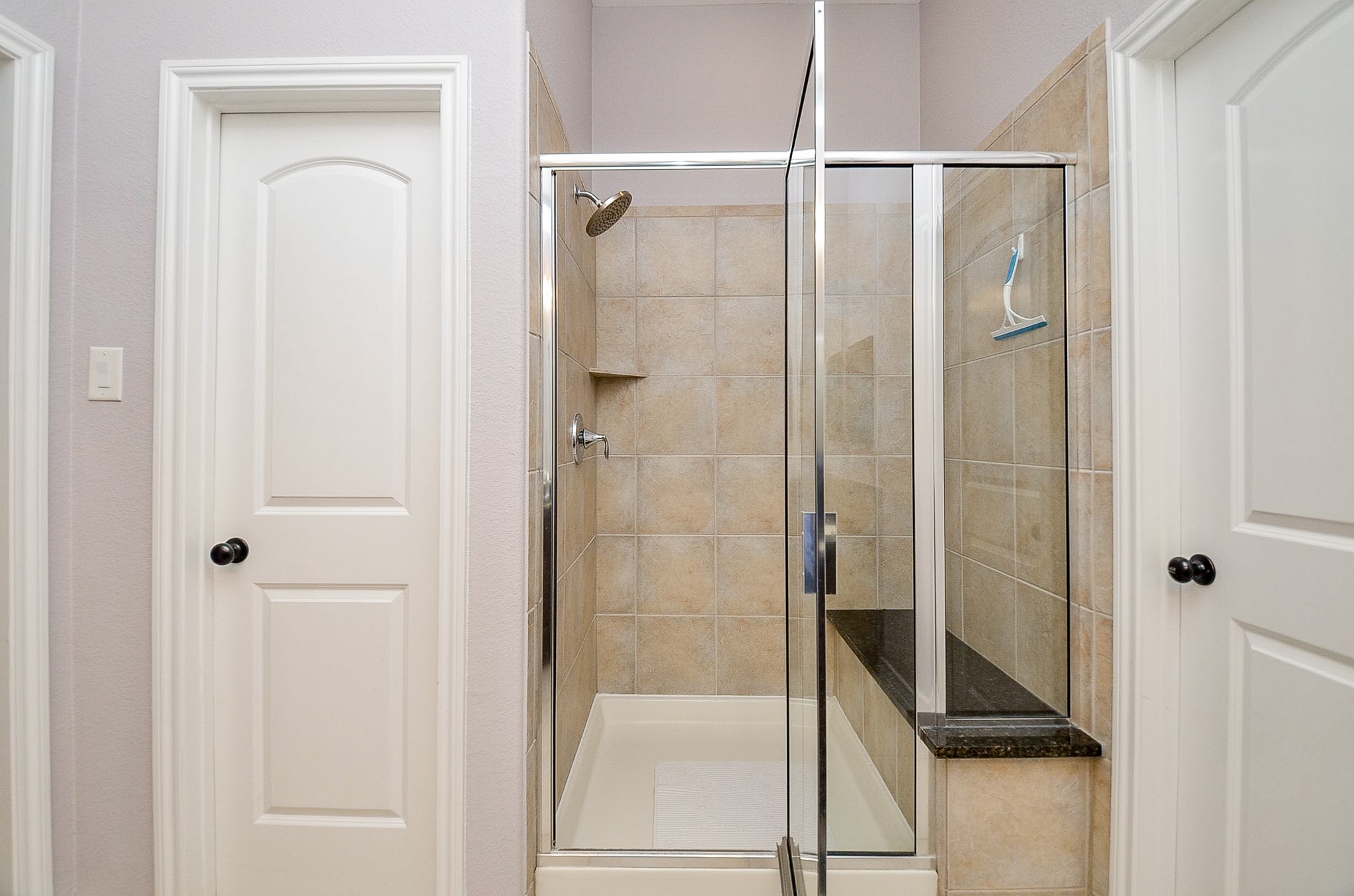 1510 Kent Valley Lane Rosenberg, TX 77471 - Photo 25 of 33 a bathroom with a glass shower door