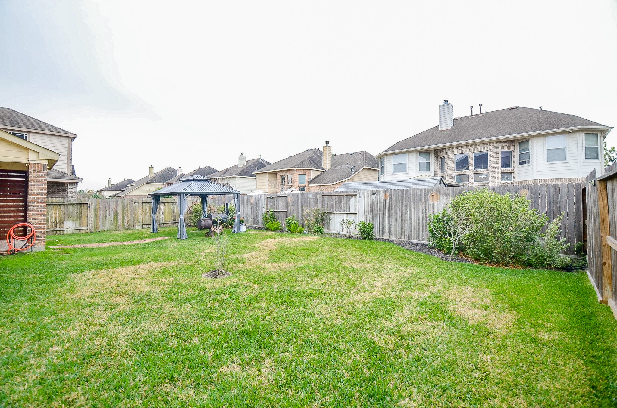 1510 Kent Valley Lane Rosenberg, TX 77471 - Photo 33 of 33 a front view of a house with yard and green space