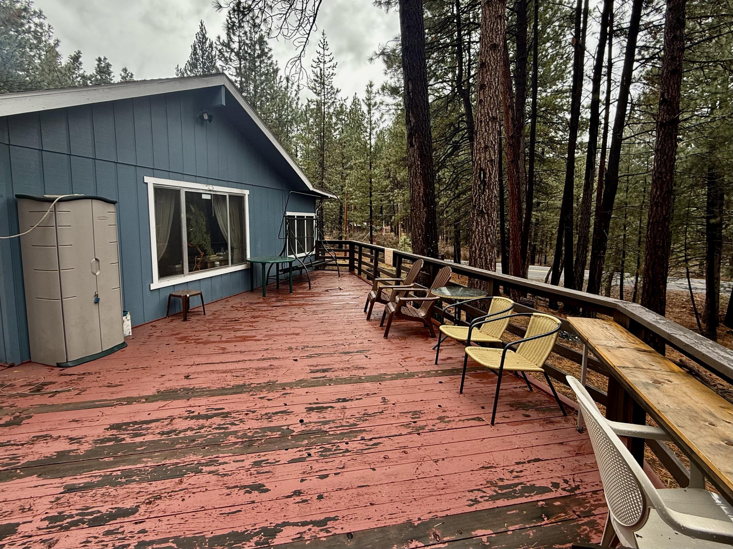 38965 Chiloquin Ridge Road Chiloquin, OR 97624 - Photo 7 of 59 a backyard of a house with wooden floor and outdoor seating