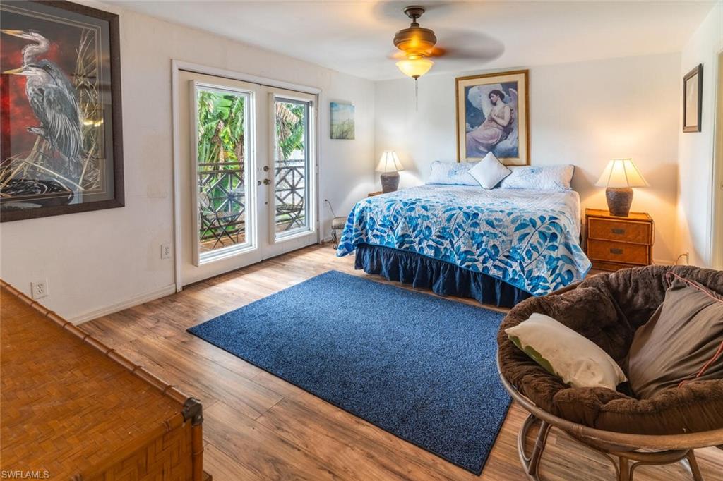 1031 Ridge Street Naples, FL 34103 - Photo 11 of 38 Bedroom with light