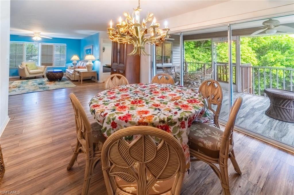 1031 Ridge Street Naples, FL 34103 - Photo 7 of 38 Dining space with chandalier