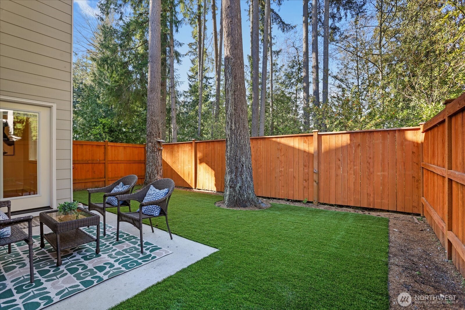 121 171st Place Southwest, Unit B Bothell, WA 98012 - Photo 18 of 36 a view of a backyard with sitting area