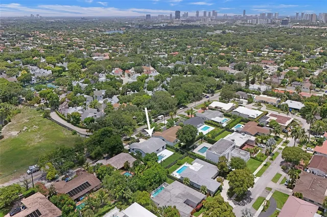 an aerial view of a city with lots of residential buildings