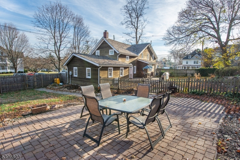 111 Main Street Succasunna, NJ 07876 - Photo 12 of 45 a view of a house with backyard and a trees