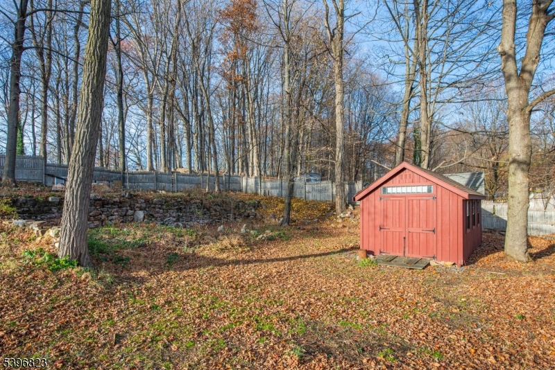 111 Main Street Succasunna, NJ 07876 - Photo 17 of 45 a front view of a house with a yard