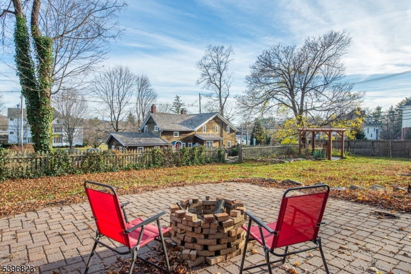 111 Main Street Succasunna, NJ 07876 - Photo 18 of 45 a view of a house with backyard and sitting area