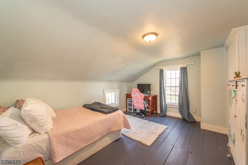 111 Main Street Succasunna, NJ 07876 - Photo 25 of 45 a bedroom with a large bed and a window