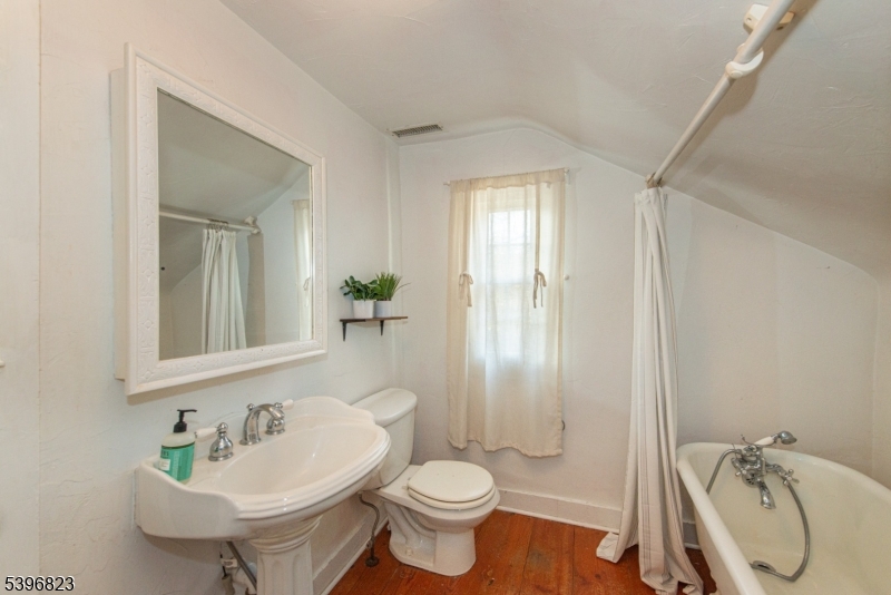 111 Main Street Succasunna, NJ 07876 - Photo 26 of 45 a bathroom with a sink toilet and shower