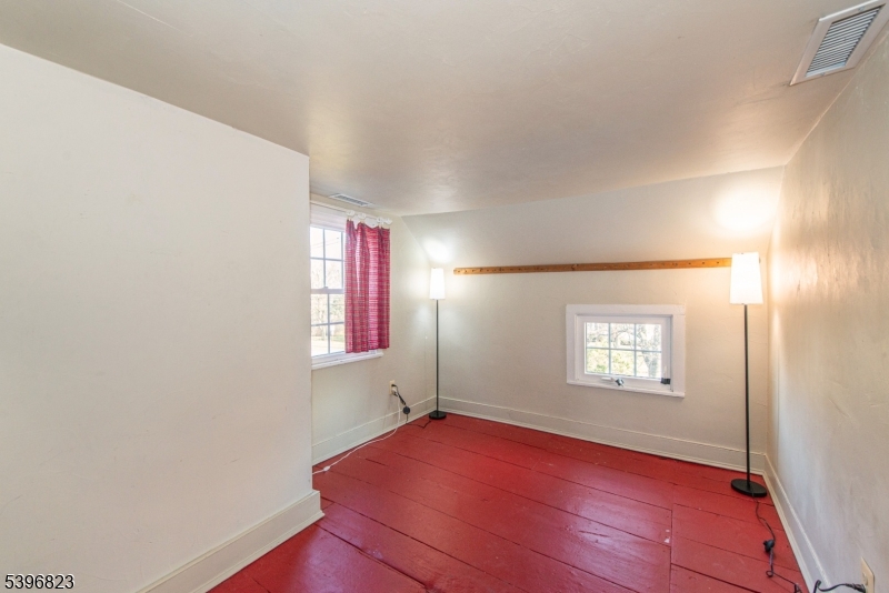 111 Main Street Succasunna, NJ 07876 - Photo 30 of 45 an empty room with windows