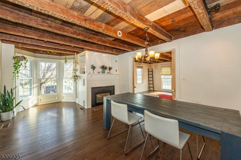 111 Main Street Succasunna, NJ 07876 - Photo 40 of 45 a view of a dining room with furniture window and wooden floor