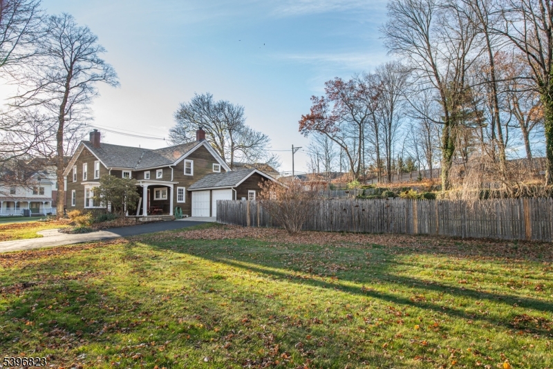 111 Main Street Succasunna, NJ 07876 - Photo 7 of 45 a view of a house with a yard