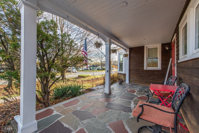 111 Main Street Succasunna, NJ 07876 - Photo 9 of 45 a view of a porch with chairs and backyard