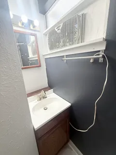 a room with a table and a window