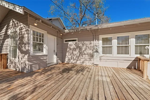 a view of a house with a large window