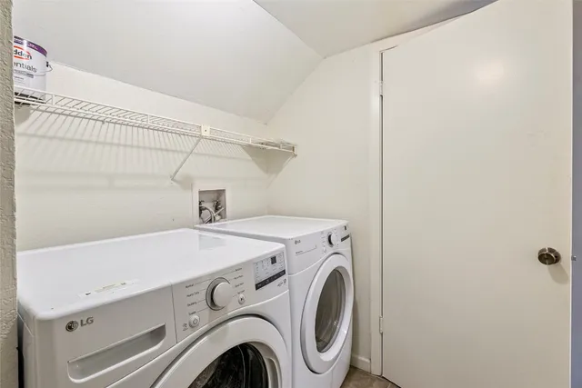a utility room with dryer and washer