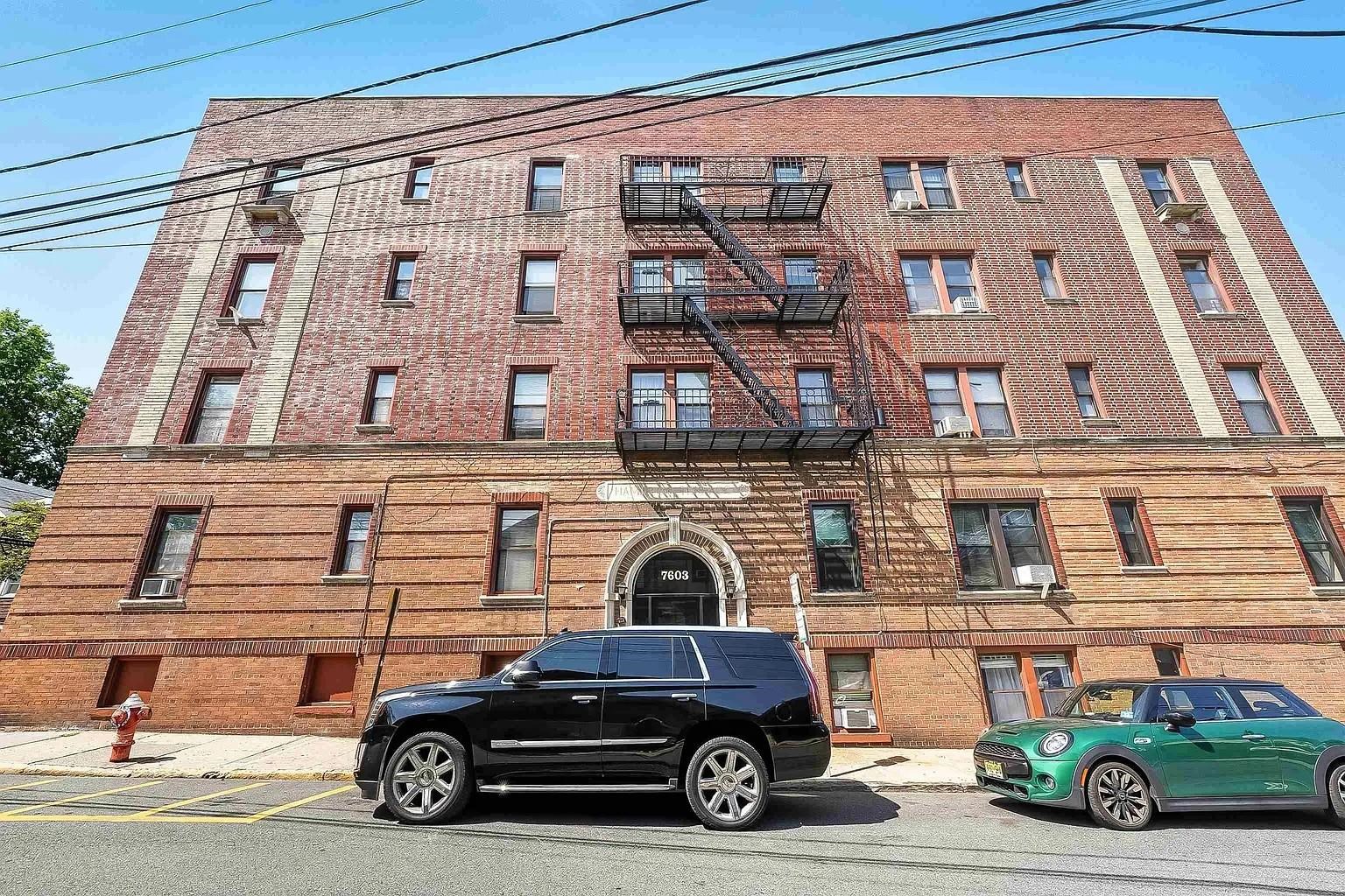 a car parked in front of a building
