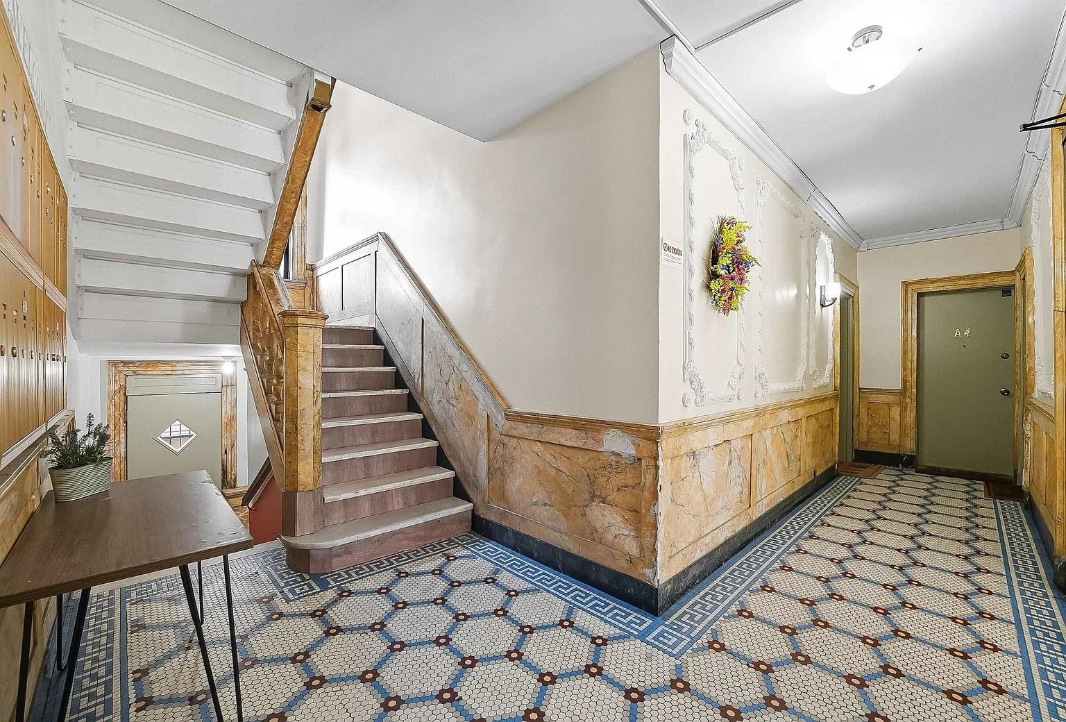 7603 1st Avenue, Unit B2 North Bergen, NJ 07047 - Photo 2 of 4 a view of a hallway with entryway and stairs
