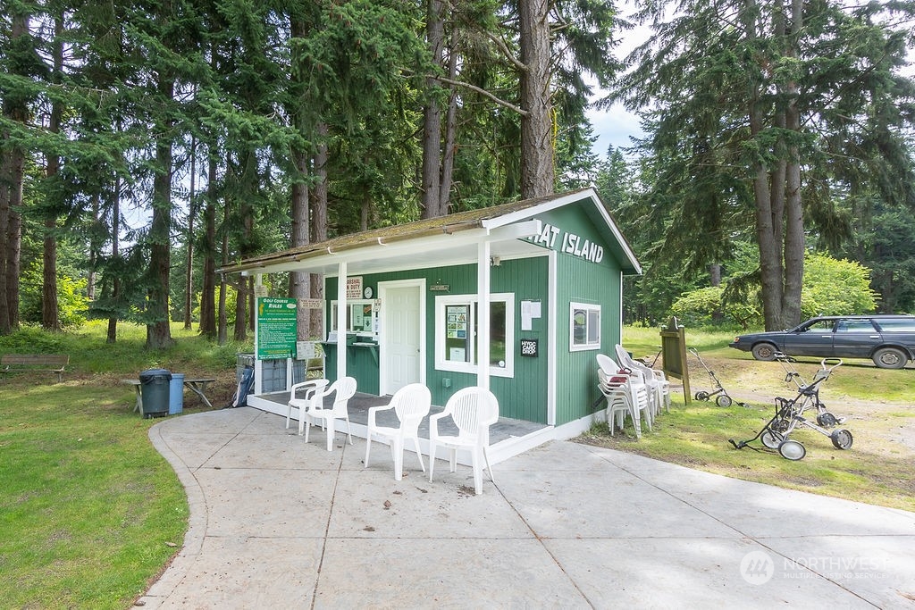 113 Port Susan Drive Everett, WA 98201 - Photo 13 of 23 a view of a house with backyard patio and swimming pool
