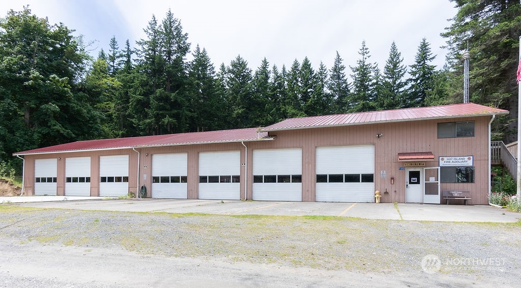 113 Port Susan Drive Everett, WA 98201 - Photo 17 of 23 a front view of a building with trees