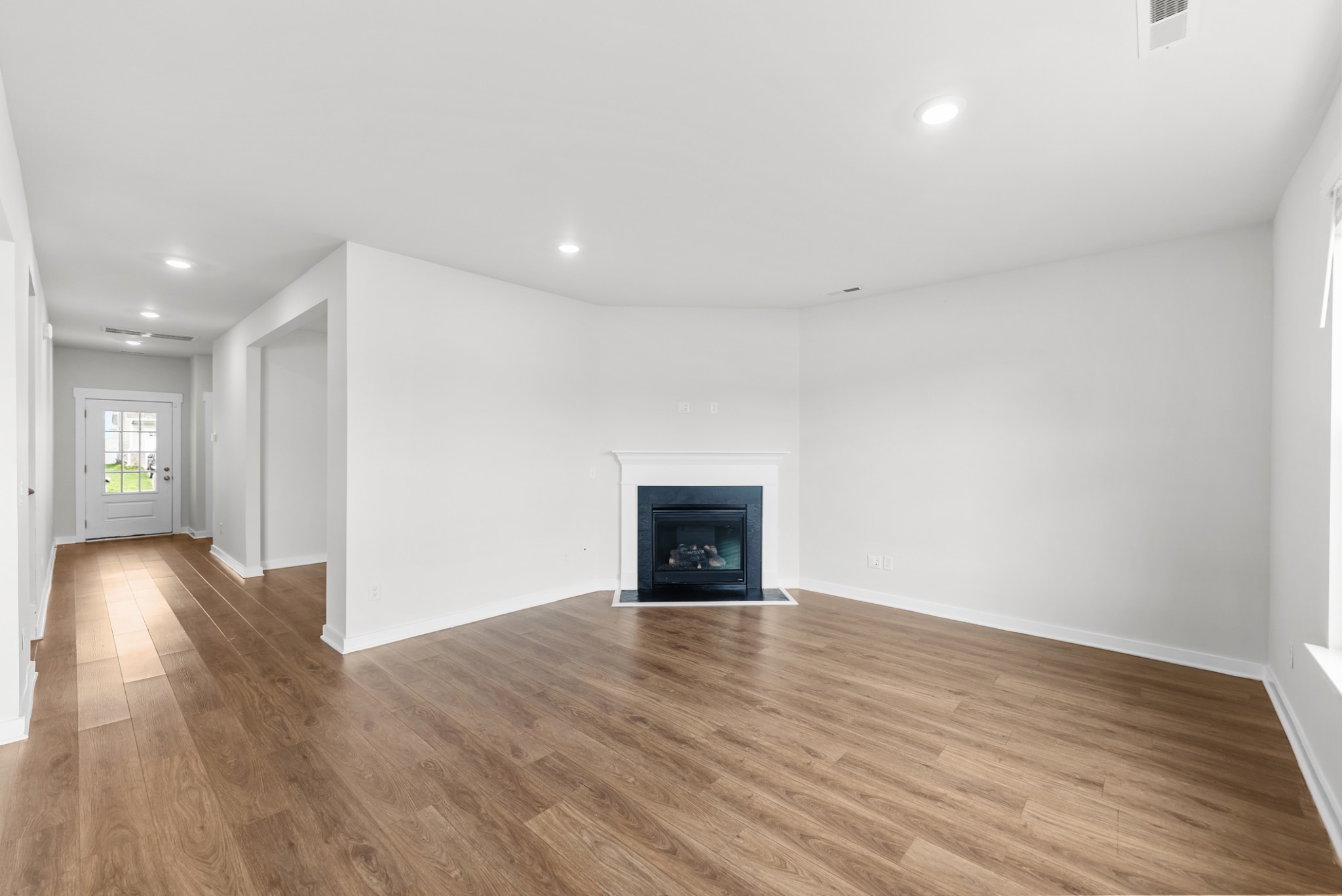 1255 Inverness Pass Lebanon, TN 37087 - Photo 8 of 40 a view of an empty room with wooden floor