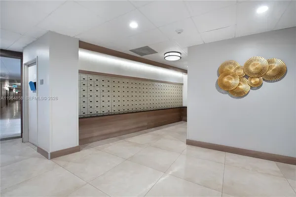 a view of a hallway with a room