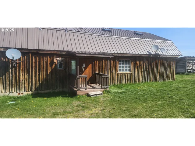 a view of a backyard with a garden