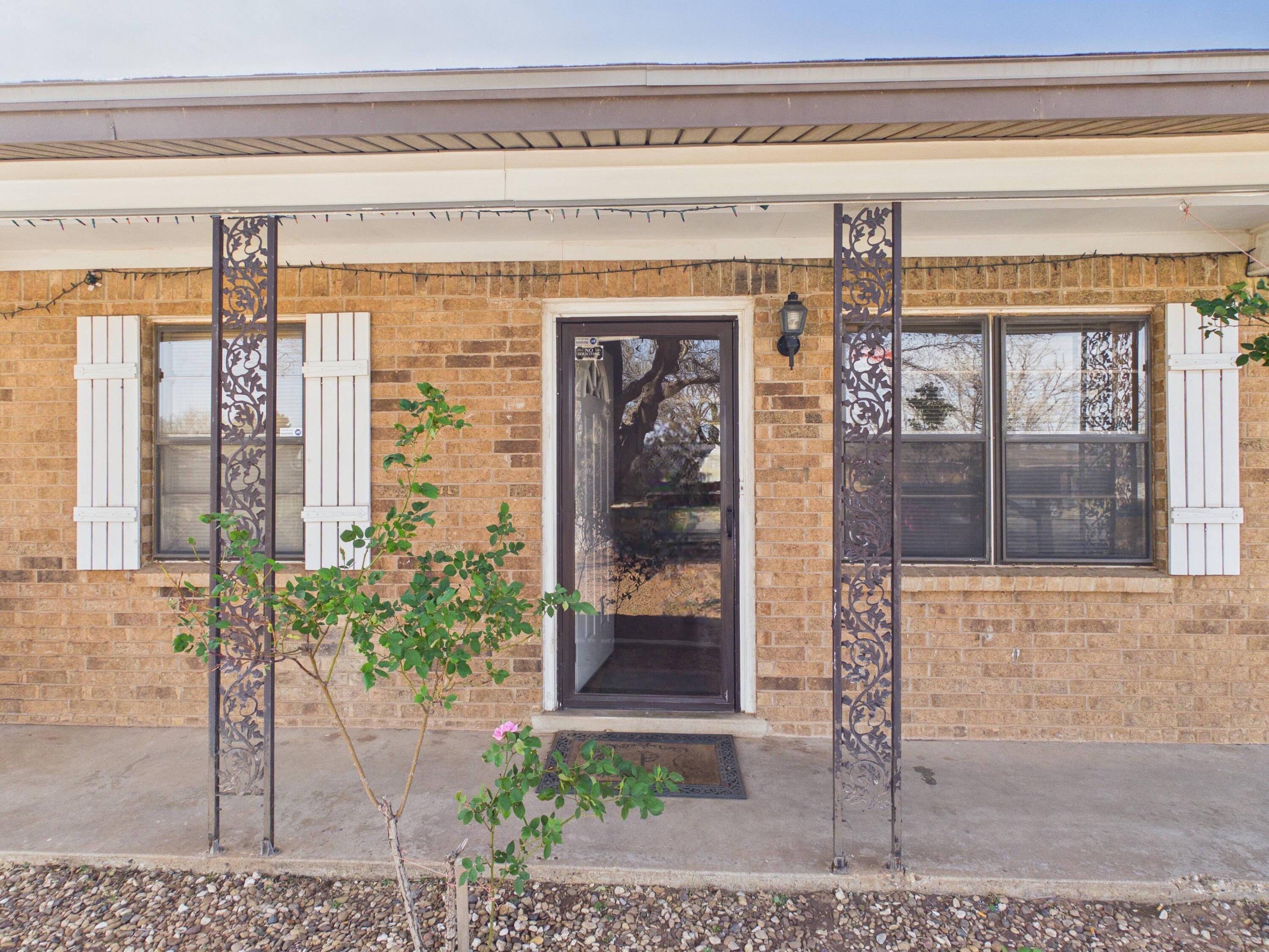 4825 10th Street Lubbock, TX 79416 - Photo 6 of 27 a view of a entryway front of a house