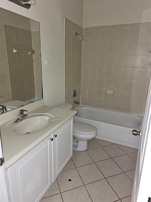 23519 Southwest 112th Court Homestead, FL 33032 - Photo 5 of 19 a bathroom with a granite countertop sink toilet and shower