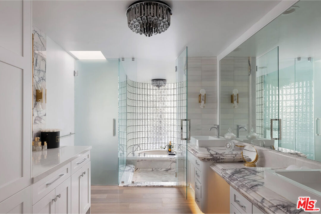 0 Arenal Road Carlsbad, CA 92009 - Photo 16 of 42 a large bathroom with a granite countertop tub sink a mirror and shower