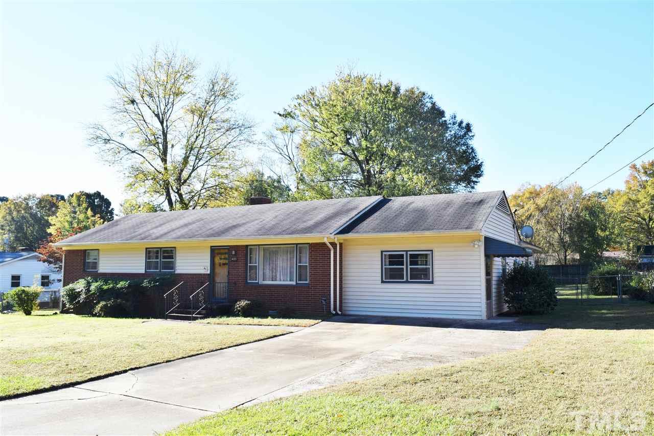 405 Winterlochen Road Raleigh, NC 27603 - Photo 1 of 25 a front view of a house with a yard