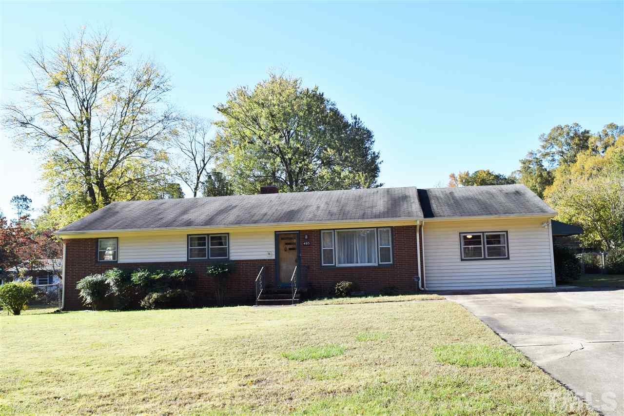 405 Winterlochen Road Raleigh, NC 27603 - Photo 2 of 25 a front view of a house with a yard