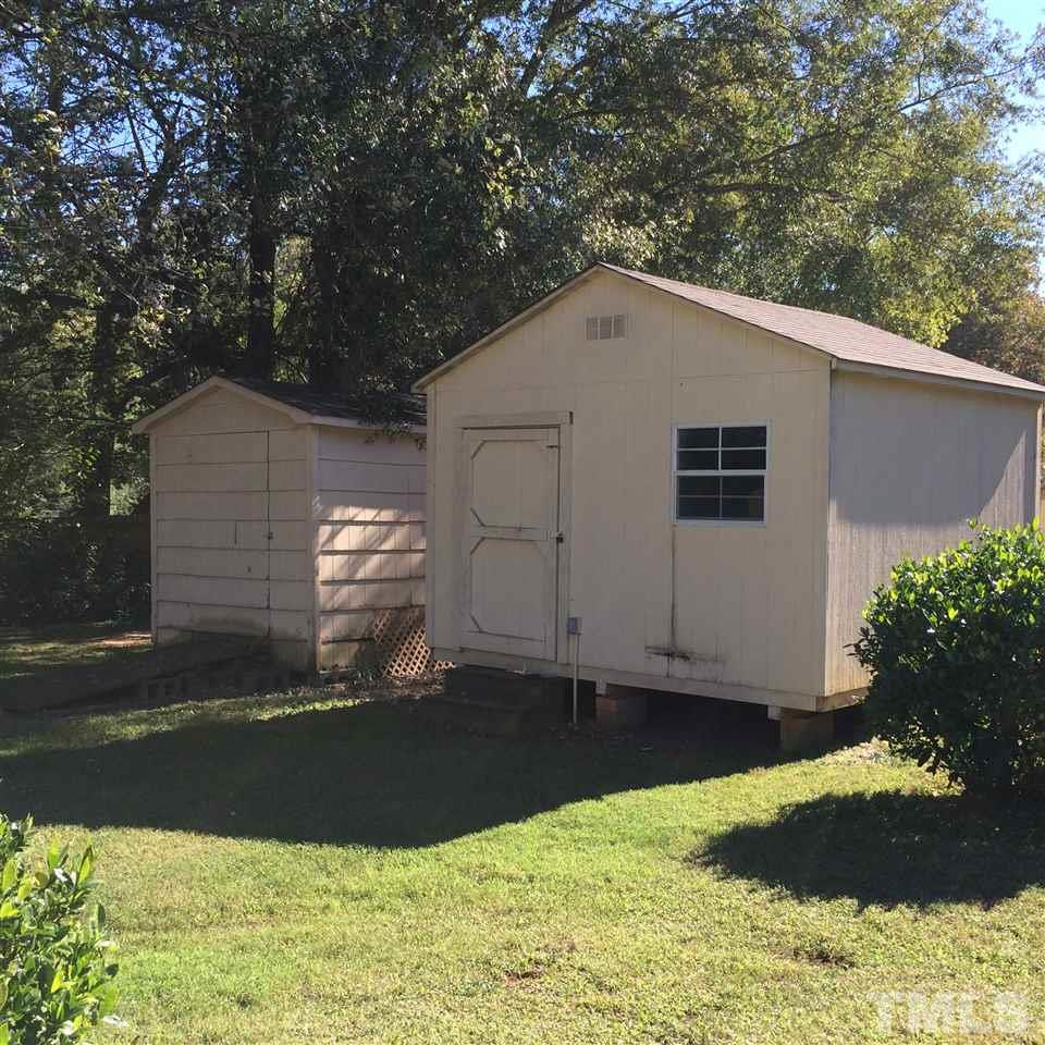 405 Winterlochen Road Raleigh, NC 27603 - Photo 25 of 25 a backyard of house with yard