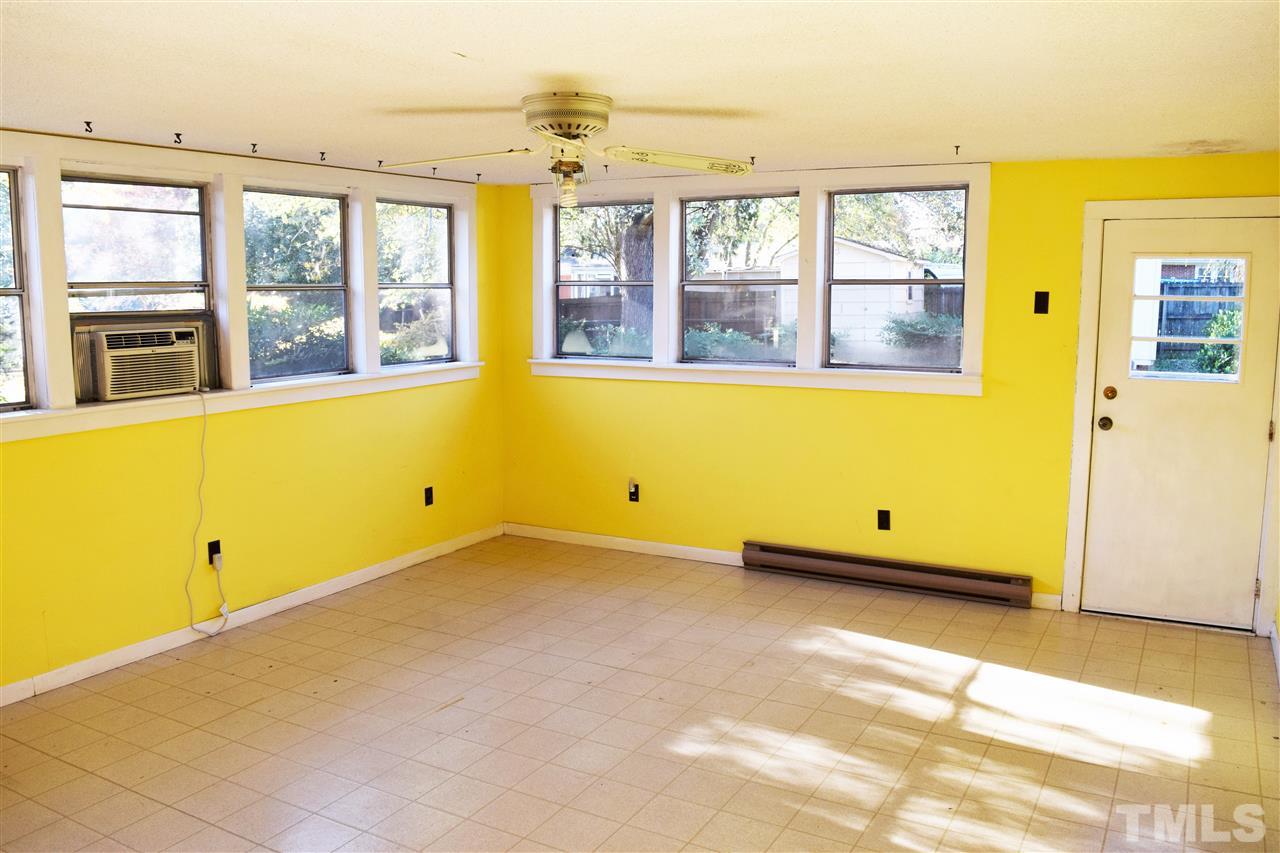 405 Winterlochen Road Raleigh, NC 27603 - Photo 10 of 25 a view of an empty room with a window