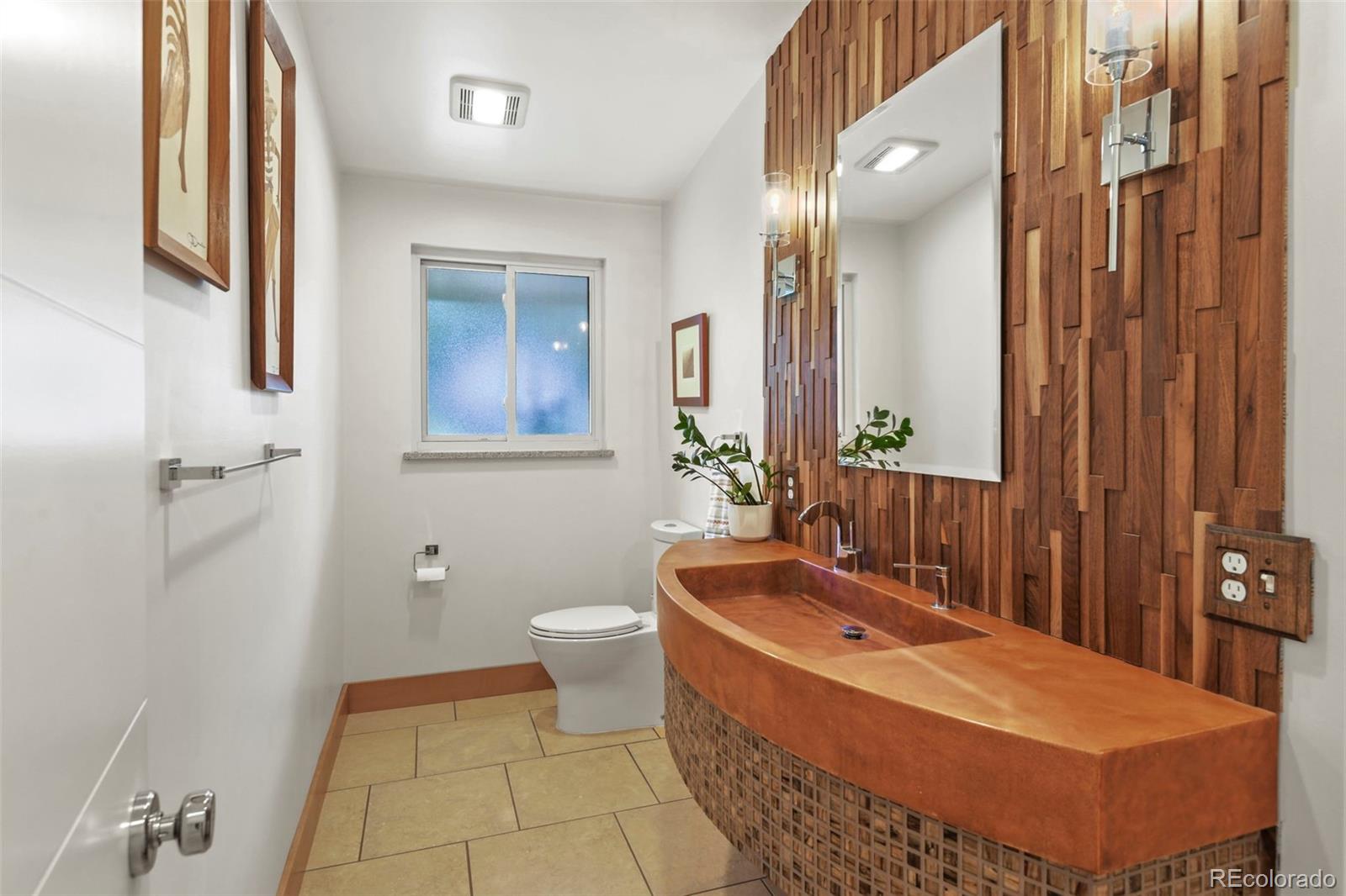 14010 Braun Road Golden, CO 80401 - Photo 20 of 49 a bathroom with a tub sink and mirror