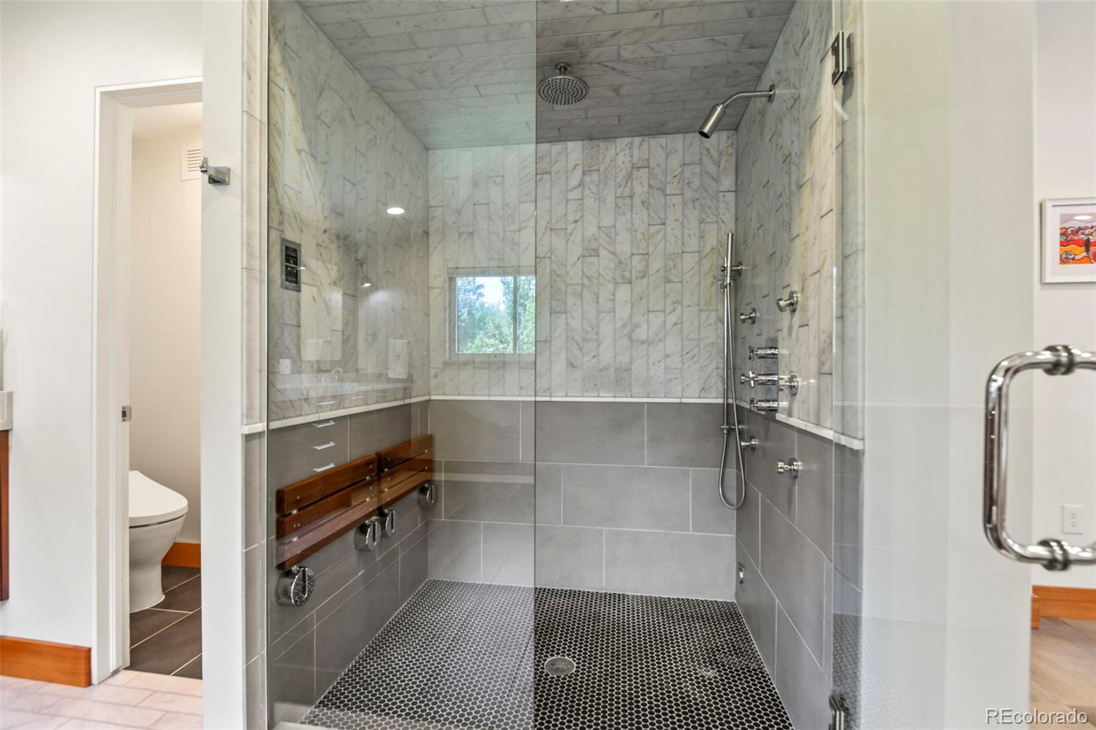 14010 Braun Road Golden, CO 80401 - Photo 28 of 49 a bathroom with a shower