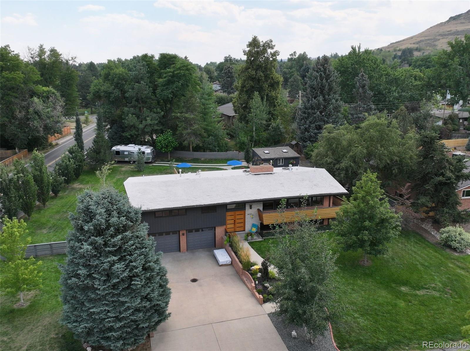 14010 Braun Road Golden, CO 80401 - Photo 35 of 49 a view of a patio in front of a yard