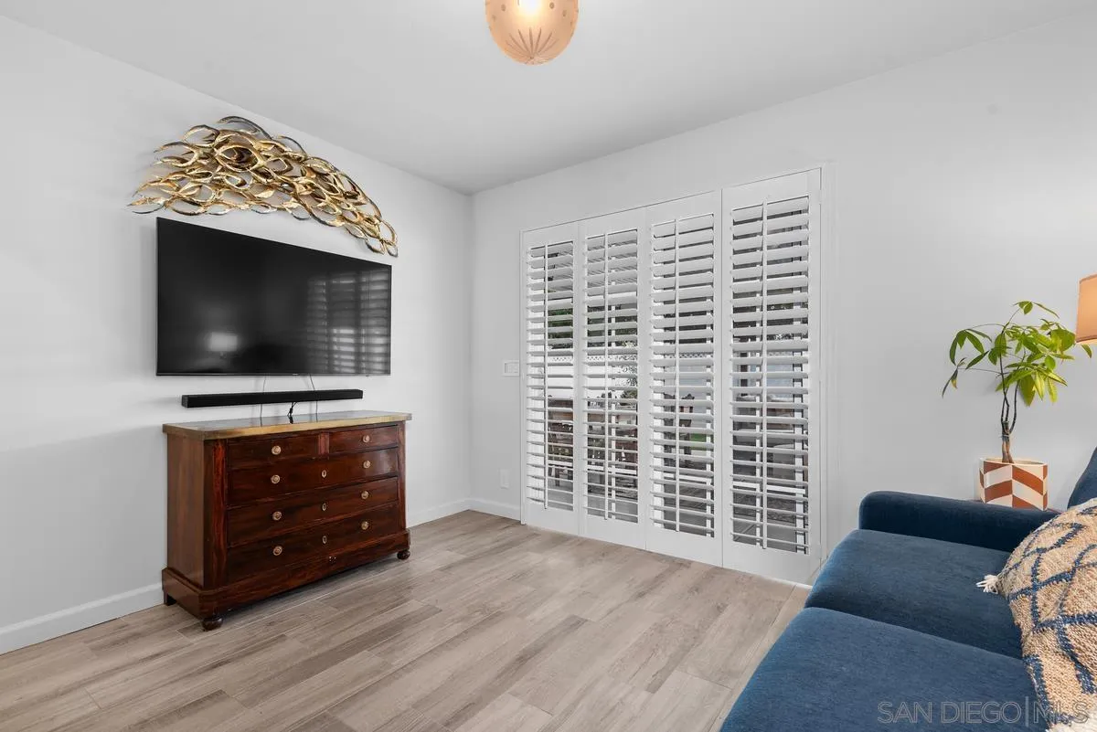763 Snapdragon Street Encinitas, CA 92024 - Photo 16 of 22 a living room with furniture and a flat screen tv