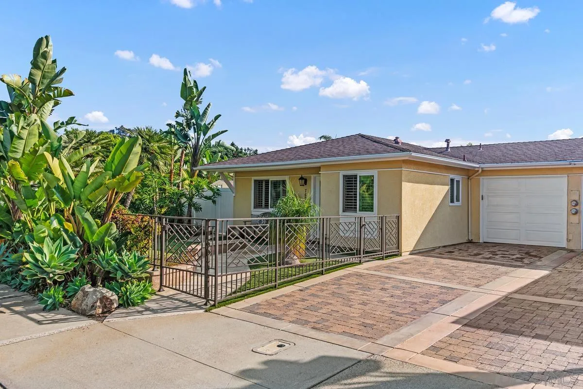 763 Snapdragon Street Encinitas, CA 92024 - Photo 20 of 22 a view of house with a garden and pathway