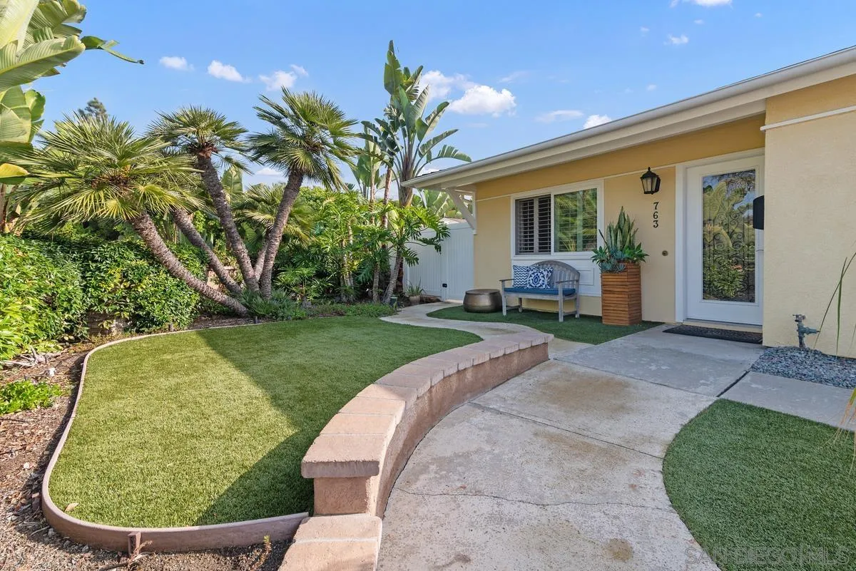 763 Snapdragon Street Encinitas, CA 92024 - Photo 2 of 22 a view of a house with a backyard porch and sitting area