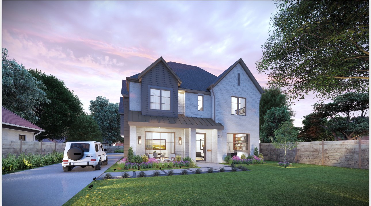 a front view of a house with a garden and trees
